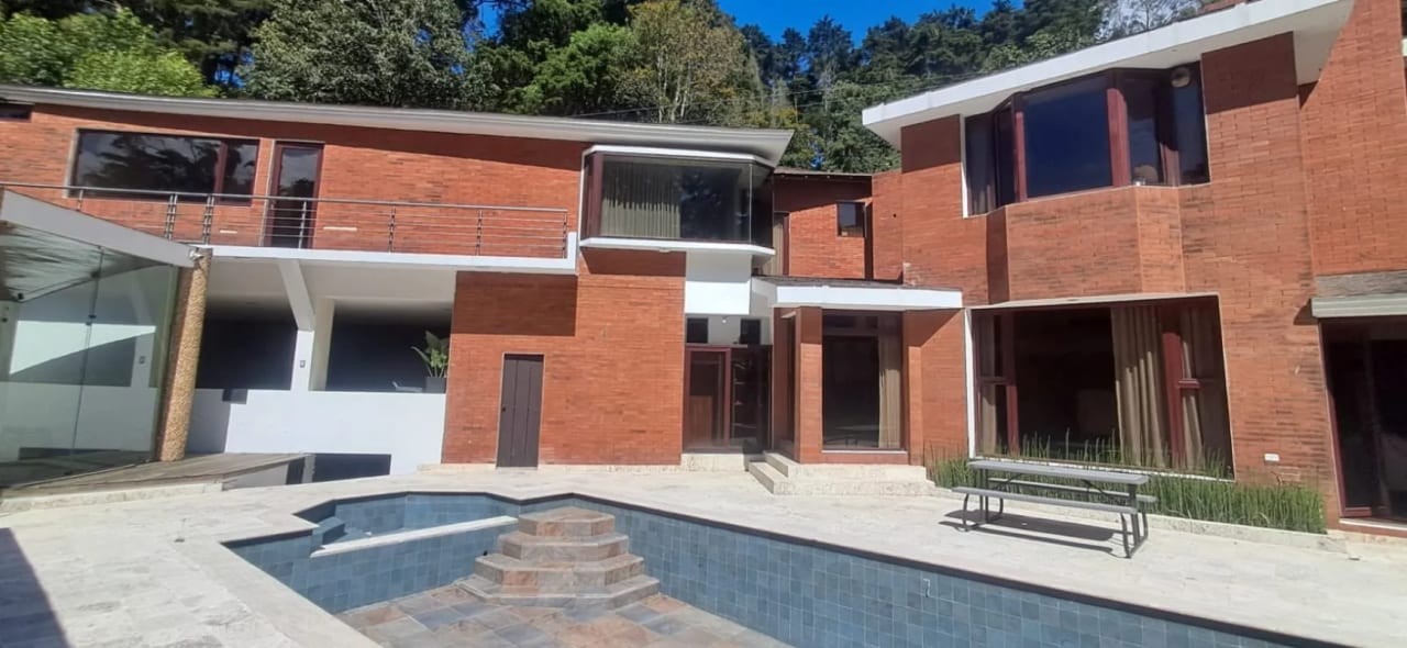VENDO CASA CON PISCINA, SAUNA, JACUZZI, KM.18.7 CAES (copia) — Casa en Venta en Condominio La Mirage, Carretera a El Salvador, Guatemala, Ciudad — foto 4 de 11
